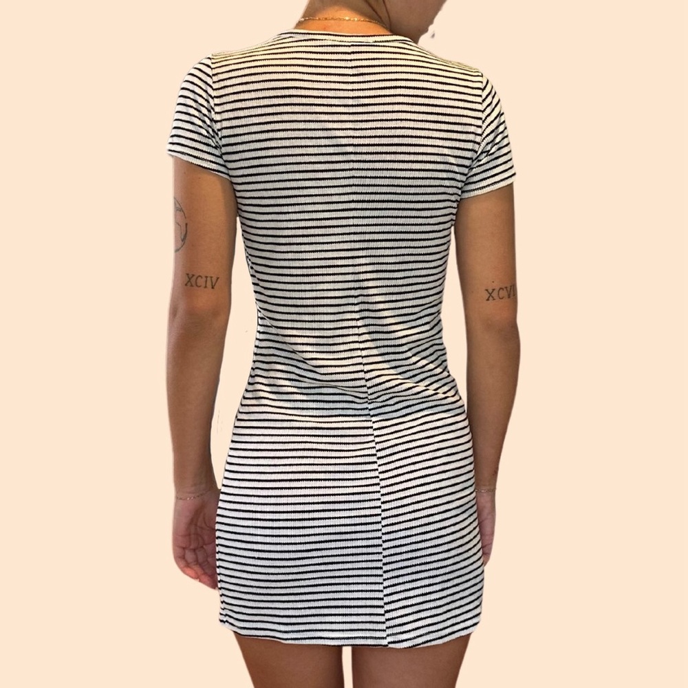 Form fitting subdued striped dress